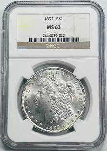 1892 Morgan Silver Dollar NGC MS 63 Uncirculated Coin: 1892 Morgan Silver Dollar NGC MS 63 Uncirculated Coin This 1892 Morgan Silver Dollar is certified by NGC with a grade of MS 63, indicating it is in uncirculated condition. Struck from high-quality sil