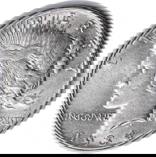 1934 Peace Silver Dollar AU Uncertified Silver Coin #723: 1934 Peace Silver Dollar AU Uncertified Silver Coin #723 This 1934 Peace Silver Dollar features a beautiful design and is a notable addition for any coin collector. With a grade of AU (Almost Uncircul