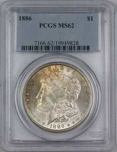 1886 Morgan Silver Dollar PCGS MS-62 Uncirculated Lightly Toned Silver Coin: 1886 Morgan Silver Dollar PCGS MS-62 Uncirculated Lightly Toned Silver Coin This 1886 Morgan Silver Dollar is a remarkable piece, certified by PCGS with a grade of MS-62. Struck in Philadelphia, this