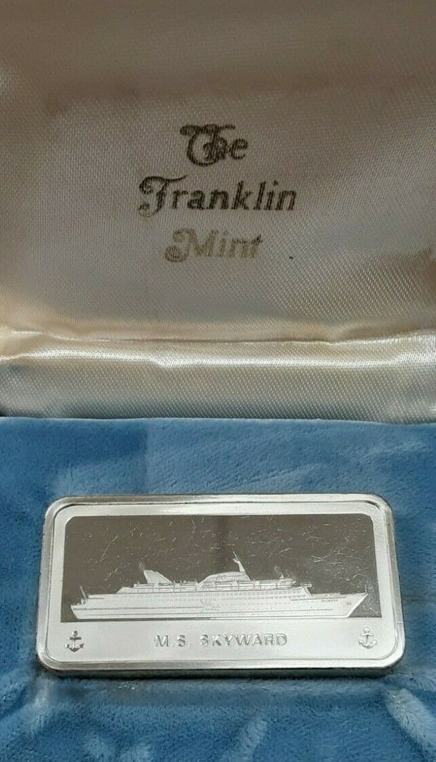 Franklin Mint Skyward Cruise Ship 1000 Grain Sterling Silver Ingot in Case: Franklin Mint Skyward Cruise Ship 1000 Grain Sterling Silver Ingot in Case This Franklin Mint MS Skyward Cruise Ship ingot is crafted from 1000 grain sterling silver and comes in a protective case. It