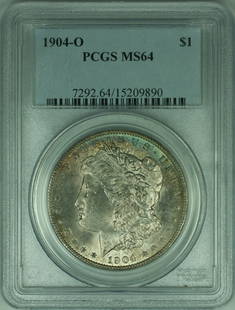1904-O Morgan Silver Dollar PCGS MS-64 Crescent Toning: 1904-O Morgan Silver Dollar PCGS MS-64 Crescent Toning This 1904-O Morgan Silver Dollar is a stunning representation of American numismatic history. Graded MS-64 by PCGS, this uncirculated coin featur