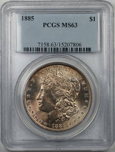 1885 Morgan Silver Dollar Coin PCGS MS 63 Uncirculated Light Toning: 1885 Morgan Silver Dollar Coin PCGS MS 63 Uncirculated Light Toning This 1885 Morgan Silver Dollar Coin features a stunning uncirculated grade of MS 63, certified by PCGS. Minted in Philadelphia, this