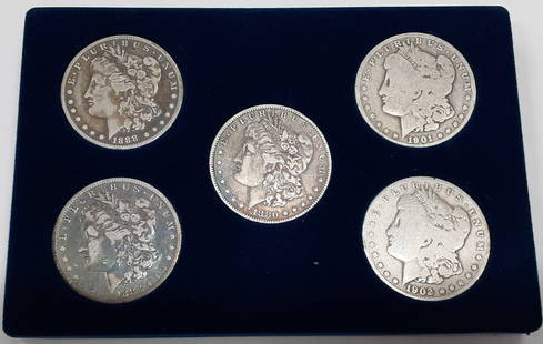 US Silver Dollar Set 5 New Orleans Mint Morgan Dollars in Case: US Silver Dollar Set 5 New Orleans Mint Morgan Dollars in Case This US Silver Dollar Set features five Morgan Dollars minted in New Orleans. Each coin is in circulated condition, showcasing the histor