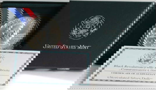 1997 Uncirculated Black Revolutionary War Patriots Silver Coin: 1997 Uncirculated Black Revolutionary War Patriots Silver Coin This 1997 Black Revolutionary War Patriots Commemorative Coin celebrates a significant historical event. It features a denomination of $1