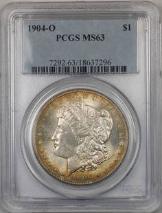 1904-O Morgan Silver Dollar PCGS MS 63 Toned Coin: 1904-O Morgan Silver Dollar PCGS MS 63 Toned Coin This 1904-O Morgan Silver Dollar is a stunning piece of numismatic history, certified by PCGS with a grade of MS 63. Struck in New Orleans, this uncir