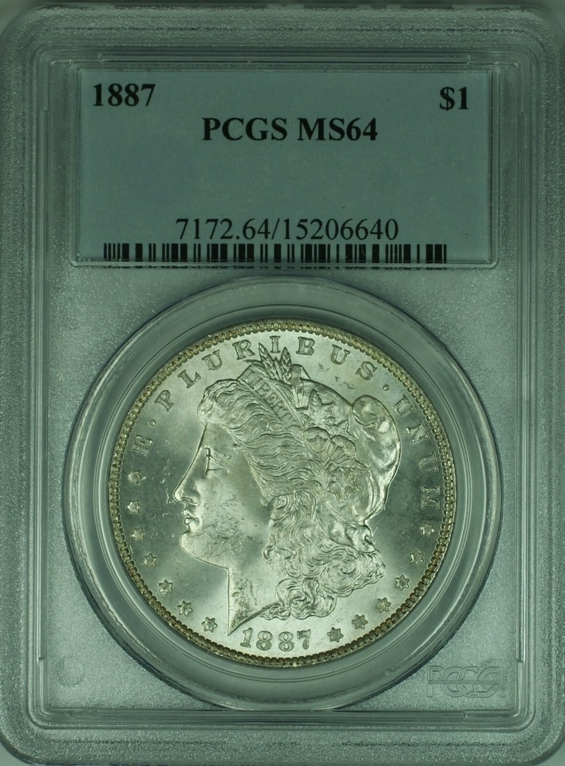 1887 Morgan Silver Dollar Coin PCGS MS64 Toned Reverse $1: 1887 Morgan Silver Dollar Coin PCGS MS64 Toned Reverse $1 This 1887 Morgan Silver Dollar Coin features a stunning uncirculated grade of MS 64, certified by PCGS. Minted in Philadelphia, this coin show