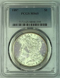 1887 Morgan Silver Dollar Coin PCGS MS 65 Uncirculated: 1887 Morgan Silver Dollar Coin PCGS MS 65 Uncirculated This 1887 Morgan Silver Dollar is a remarkable piece of numismatic history, featuring the iconic Morgan design that has captivated collectors for