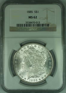 1885 Morgan Silver Dollar NGC MS62 Uncirculated Coin: 1885 Morgan Silver Dollar NGC MS62 Uncirculated Coin This 1885 Morgan Silver Dollar is a remarkable piece of numismatic history, minted in Philadelphia. The coin is composed of high-quality silver wit