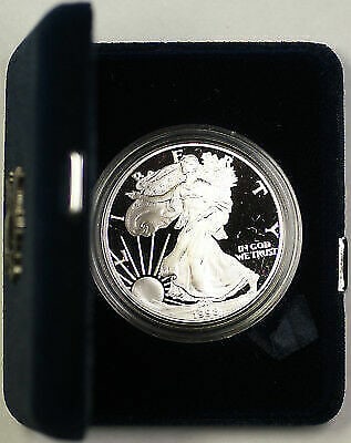 1998 American Silver Eagle 1oz Coin Proof with COA in OGP: 1998 American Silver Eagle 1oz Coin Proof with COA in OGP This 1998 American Silver Eagle is a stunning 1 oz. silver coin that showcases the artistry and craftsmanship of the U.S. Mint. With a remarka