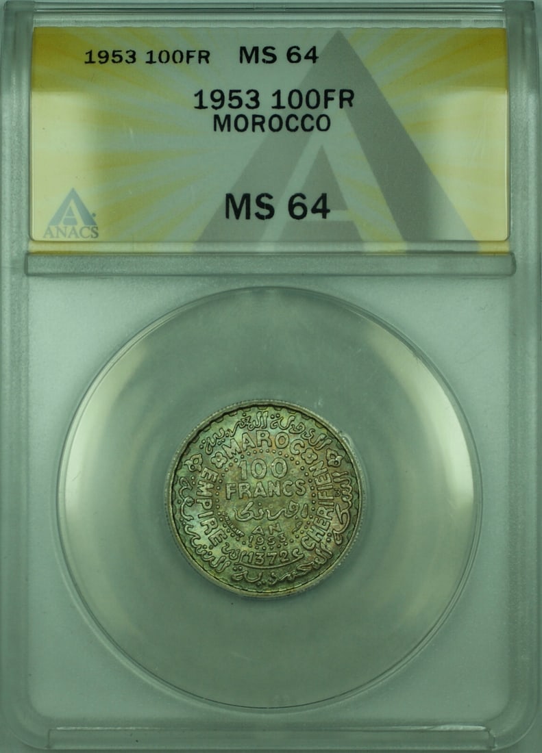 1953 Morocco 100 Francs Silver Coin ANACS MS 64 Toned: 1953 Morocco 100 Francs Silver Coin ANACS MS 64 Toned This 1953 100 Francs Silver Coin from Morocco is a remarkable piece, certified by ANACS with a grade of MS 64. It is uncirculated, showcasing its 