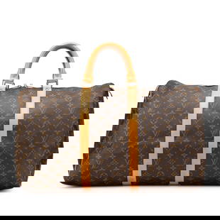 Louis Vuitton Monogram Keepall 50 Travel Bag Canvas Brown: Louis Vuitton Monogram Keepall 50 Travel Bag Canvas Brown The Louis Vuitton Monogram Keepall 50 is a classic travel bag made with a durable monogram canvas body and adorned with vachetta leather trim.