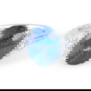 GIA 7.58ct Blue Sapphire Diamond Platinum Ring: GIA 7.58ct Blue Sapphire Diamond Platinum Ring This exquisite three-stone ring features a stunning GIA certified 7.58 ct Ceylon sapphire paired with two epaulet cut diamonds, totaling 0.74 ct. The ova