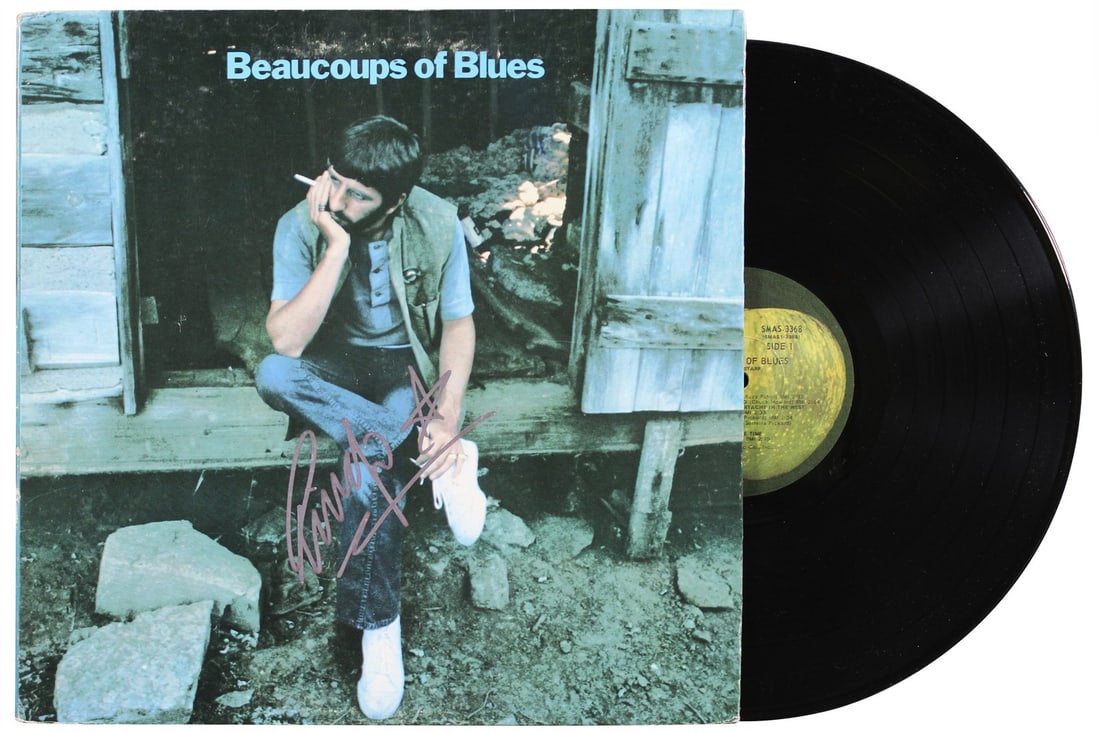 Ringo Starr Autographed Beaucoups of Blues Album with Vinyl Beckett COA: Ringo Starr Autographed Beaucoups of Blues Album with Vinyl Beckett COA This item features an autographed cover of the classic album "Beaucoups of Blues" by Ringo Starr, complete with the original vin