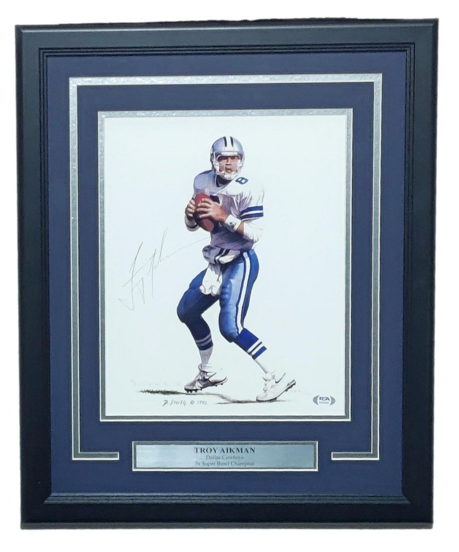 Troy Aikman Autographed 11x14 Framed Lithograph PSA Dallas Cowboys: Troy Aikman Autographed 11x14 Framed Lithograph PSA Dallas Cowboys This striking framed lithograph features the legendary Troy Aikman, an iconic player of the Dallas Cowboys. The piece is authenticate