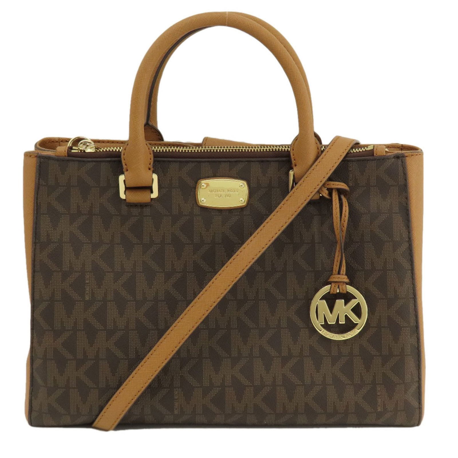 Michael Kors Brown PVC Women Tote Bag 23cm x 32cm x 13cm: Michael Kors Brown PVC Women Tote Bag 23cm x 32cm x 13cm This elegant Michael Kors tote bag is designed for women, featuring a stylish brown PVC construction that is both durable and chic. With dimens