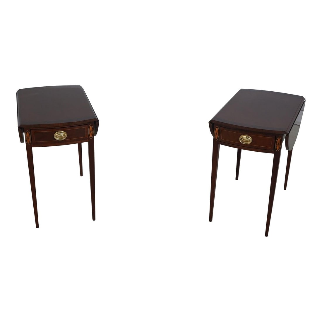 Elegant Pair of Federal Style Mahogany Pembroke Tables: Elegant Pair of Federal Style Mahogany Pembroke Tables This elegant pair of Pembroke tables showcases the timeless Federal style, crafted from solid mahogany. Each table features tall tapering legs, d