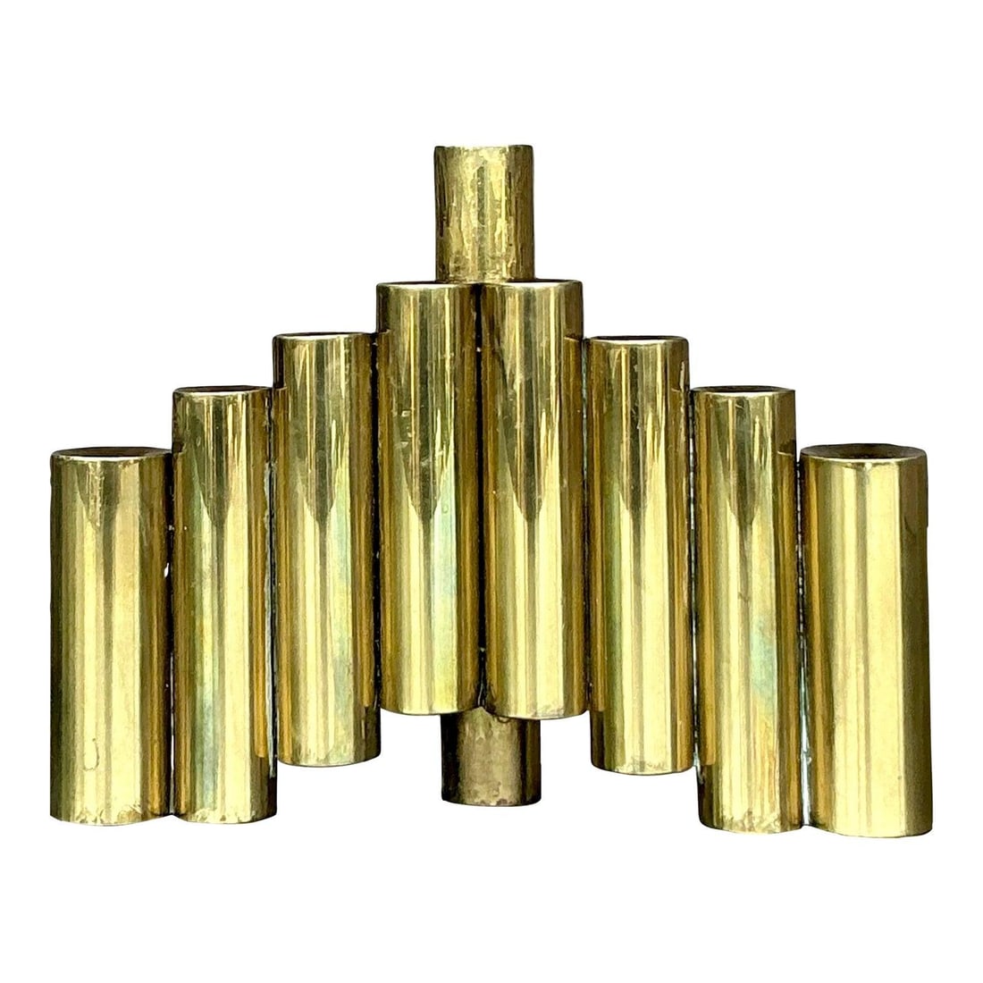 Vintage Brass Menorah Inspired by Gio Ponti Mid-Century Modern Design: Vintage Brass Menorah Inspired by Gio Ponti Mid-Century Modern Design Enhance your space with this Vintage Mid-Century Modern Brass Menorah, a stunning sculptural piece inspired by the elegant designs