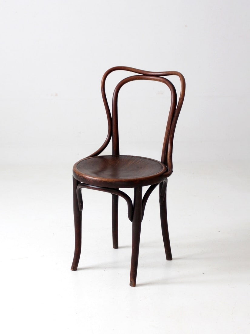 Antique Jacob & Josef Kohn Bentwood Cafe Chair 1800s: Antique Jacob & Josef Kohn Bentwood Cafe Chair 1800s This antique bentwood chair by Jacob & Josef Kohn, crafted in the late 1800s, exemplifies classic design with its decorative pressed wood seat and