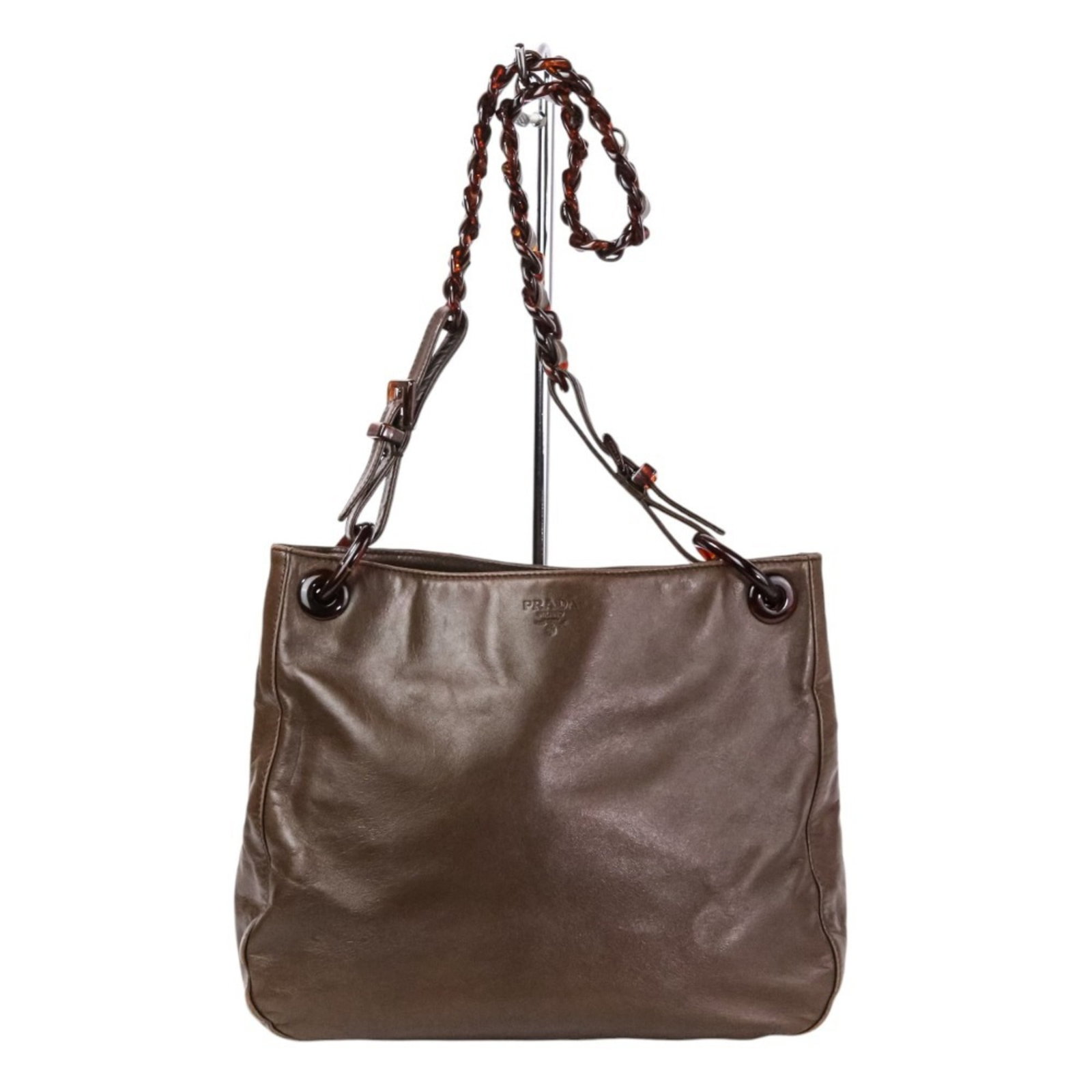 PRADA Brown Leather Plastic Chain Shoulder Bag for Women: PRADA Brown Leather Plastic Chain Shoulder Bag for Women Elevate your accessory game with this exquisite PRADA shoulder bag, crafted from a combination of leather and plastic in a rich brown hue. This