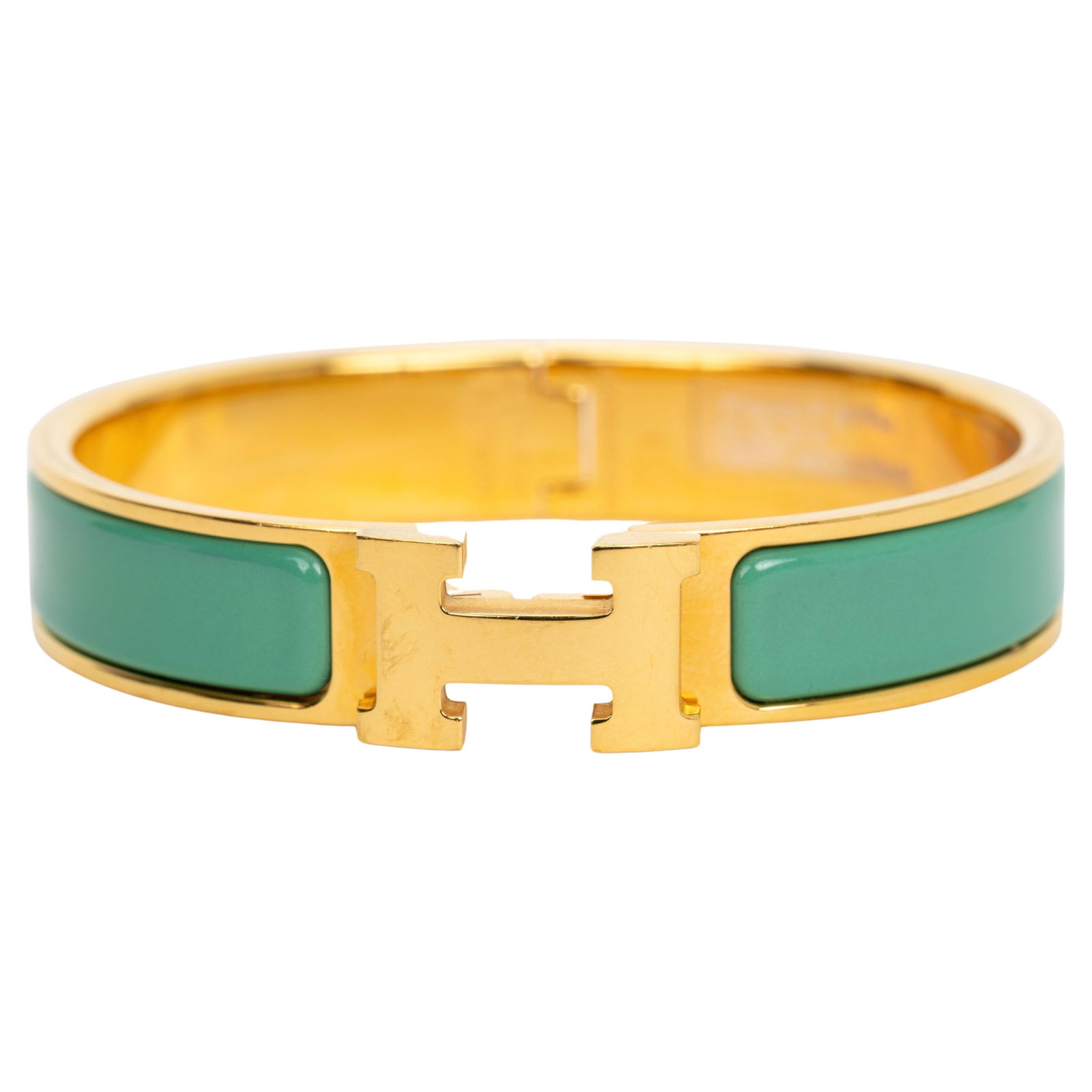 Hermes Vert Moderne H Clic Bracelet Gold Plated 2023: Hermes Vert Moderne H Clic Bracelet Gold Plated 2023 Introducing the Hermes New Vert Moderne H Clic Bracelet, a stunning piece crafted from gold plate. This narrow bracelet features a vibrant vert mod