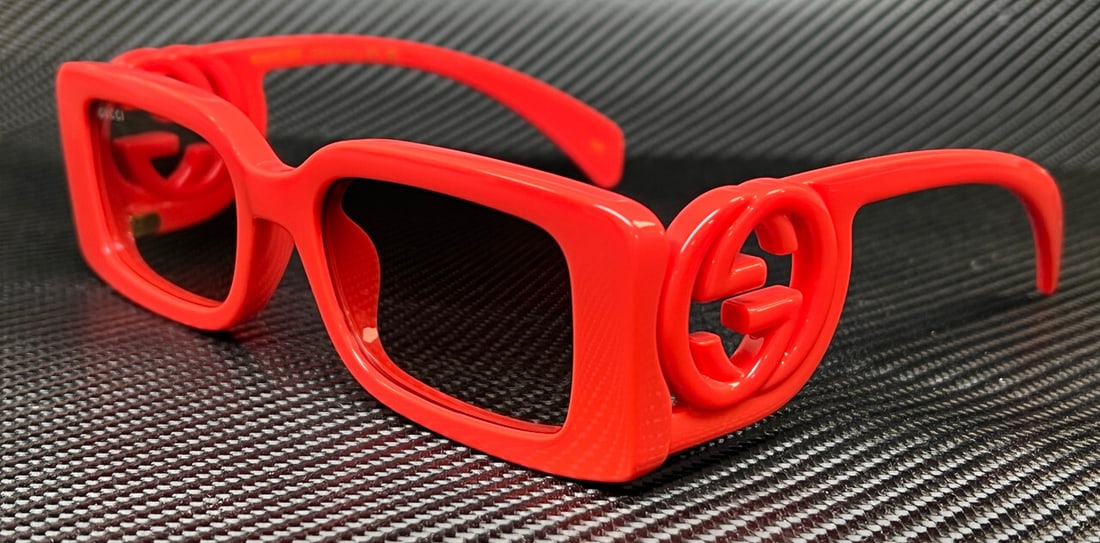 GUCCI GG1325S 005 Red Women's Sunglasses with Brown Lenses and Authenticity Certificate: GUCCI GG1325S 005 Red Women's Sunglasses with Brown Lenses and Authenticity Certificate Elevate your style with these GUCCI GG1325S 005 sunglasses, featuring a striking red frame paired with elegant b