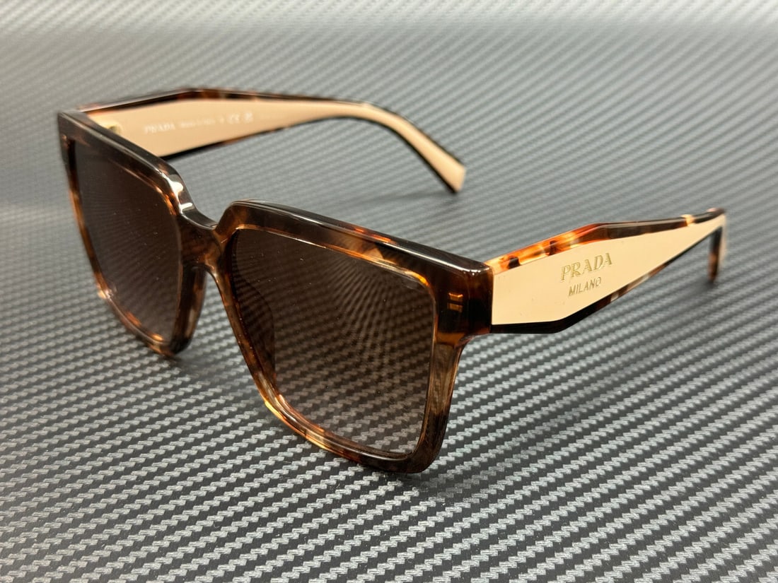 PRADA PR 24ZS 07R0A6 Caramel Tortoise Gradient Sunglasses: PRADA PR 24ZS 07R0A6 Caramel Tortoise Gradient Sunglasses Elevate your style with these PRADA PR 24ZS 07R0A6 sunglasses, featuring a chic Caramel Tortoise frame and stylish Brown Gradient lenses. Desi