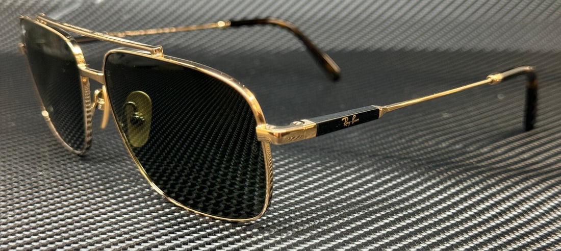 Ray-Ban RB8096 926531 Gold Titanium Green Sunglasses with Original Case: Ray-Ban RB8096 926531 Gold Titanium Green Sunglasses with Original Case Experience luxury and style with the Ray-Ban RB8096 sunglasses, featuring a stunning gold titanium frame complemented by vibrant