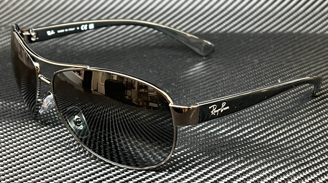Ray-Ban RB3386 Gunmetal Aviator Sunglasses Gradient Polarized 67mm: Ray-Ban RB3386 Gunmetal Aviator Sunglasses Gradient Polarized 67mm Elevate your style with the Ray-Ban RB3386 Gunmetal Pilot Sunglasses, designed for both fashion and function. These aviator sunglasse