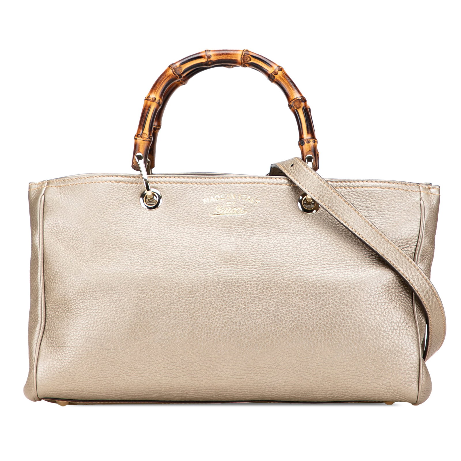 Gucci Medium Calfskin Bamboo Shopper Satchel Gold Leather: Gucci Medium Calfskin Bamboo Shopper Satchel Gold Leather The Gucci Medium Calfskin Bamboo Shopper Satchel showcases a luxurious leather body complemented by distinctive bamboo top handles. This styli