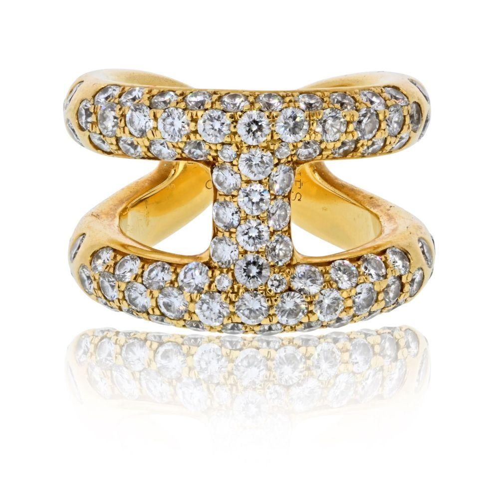 Hermes 18K Yellow Gold Estate Ring with 2.5 Carats Diamonds: Hermes 18K Yellow Gold Estate Ring with 2.5 Carats Diamonds This exquisite estate ring from Hermes features luxurious 18K yellow gold, weighing 16.2 grams. The ring showcases an approximate diamond we