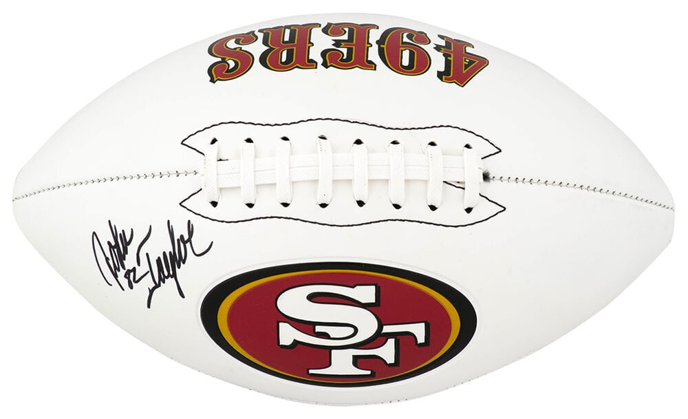 John Taylor Autographed 49ers Franklin White Logo Football with COA: John Taylor Autographed 49ers Franklin White Logo Football with COA This San Francisco 49ers Franklin white logo football features the signature of John Taylor, a celebrated player who was part of the