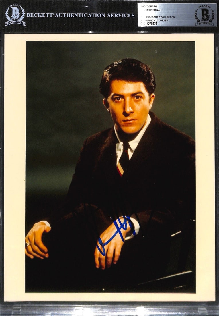 Dustin Hoffman Signed 8x10 Photograph The Graduate Beckett Authenticated: Dustin Hoffman Signed 8x10 Photograph The Graduate Beckett Authenticated This is a signed 8x10 photograph of actor Dustin Hoffman from the iconic film "The Graduate." The autograph is rendered in blue