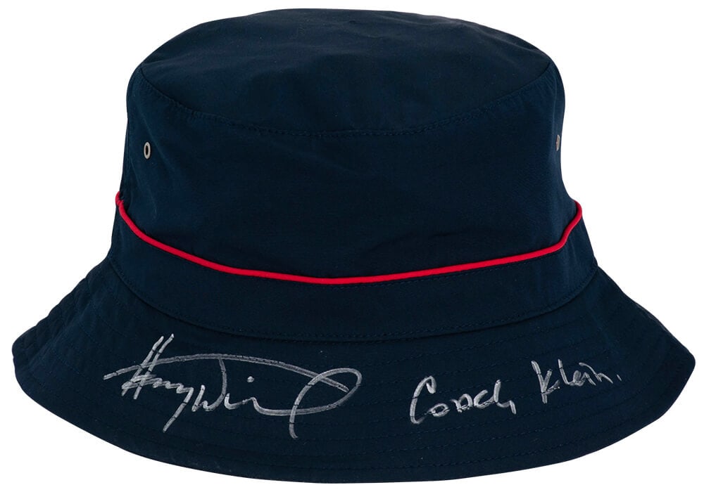 Henry Winkler Signed Waterboy Navy Coaching Hat with Coach Klein Inscription: Henry Winkler Signed Waterboy Navy Coaching Hat with Coach Klein Inscription This is an original, pre-owned navy bucket coaching hat signed by Henry Winkler, featuring the inscription 'Coach Klein.' I