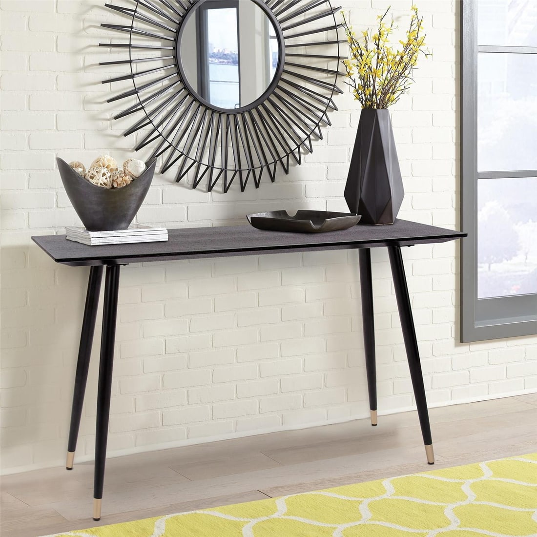 Howard Elliott Soho Dark Ash Console Table 29.75H x 47W x 16D: Howard Elliott Soho Dark Ash Console Table 29.75H x 47W x 16D Enhance your living space with this Sleek Minimalist Dark Ash Console Table from the Soho Collection. This stylish rectangular table featu