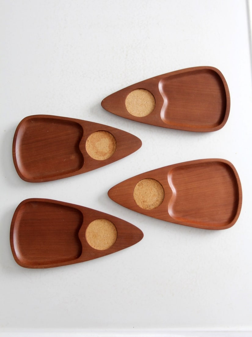 Mid-Century Sere Wood Snack Trays Set of 4 with Cork Coasters: Mid-Century Sere Wood Snack Trays Set of 4 with Cork Coasters This set of four mid-century Sere Wood snack trays features a sleek teardrop shape, expertly handcrafted from rich hardwood for a warm, na