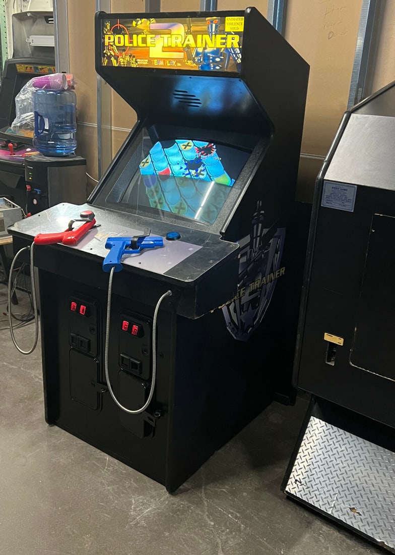 Rare 1999 Police Trainer 2 Arcade Machine by P&P Marketing 2 Player Shooting Game: Rare 1999 Police Trainer 2 Arcade Machine by P&P Marketing 2 Player Shooting Game Experience the thrill of classic arcade gaming with the Police Trainer 2 Arcade Machine by P&P Marketing, released in