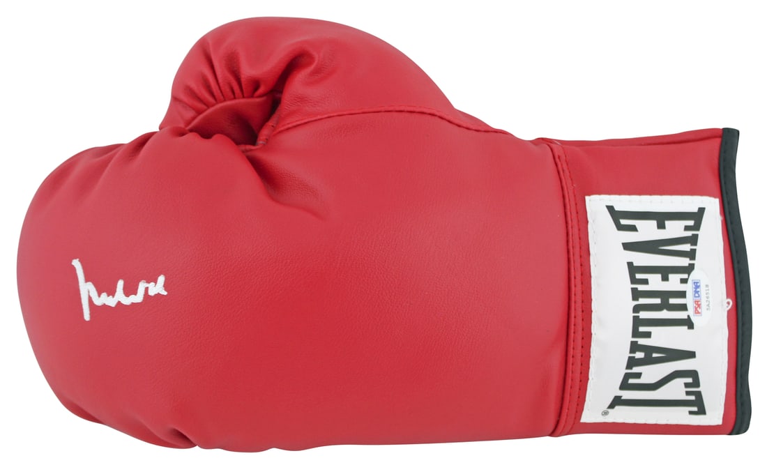 Muhammad Ali Signed Red Everlast Boxing Glove PSA/DNA Certified: Muhammad Ali Signed Red Everlast Boxing Glove PSA/DNA Certified This authentic red Everlast boxing glove has been personally signed by legendary boxer Muhammad Ali. It comes with a PSA/DNA Certificati