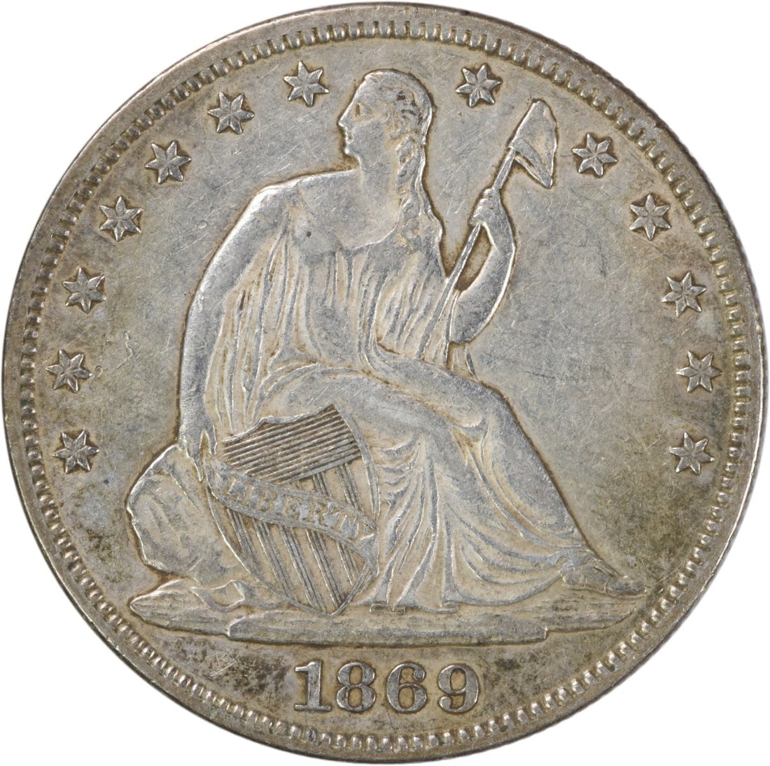 1869 Liberty Seated Half Dollar AU 90% Silver Uncertified Philadelphia Mint: 1869 Liberty Seated Half Dollar AU 90% Silver Uncertified Philadelphia Mint This 1869 Liberty Seated Half Dollar, featuring the stunning designs of Thomas Sully and Christian Gobrecht, is a remarkable
