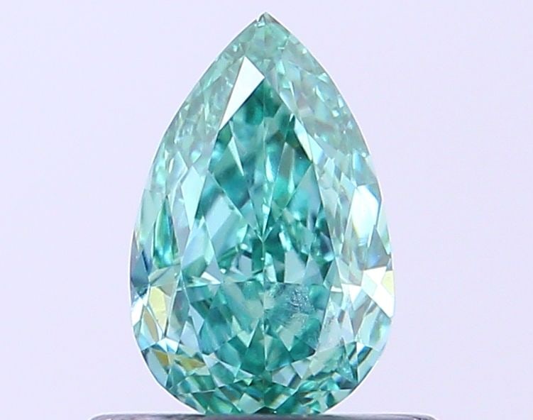 Loose Diamond - PEAR 0.5ct Fancy Vivid Green VVS2: Loose Diamond - PEAR 0.5ct Fancy Vivid Green VVS2 Source: This is a real non-mined Diamond that has been grown in a lab Shape: PEAR Carats: 0.5 Color: Fancy Vivid Green Certification: IGI Video: