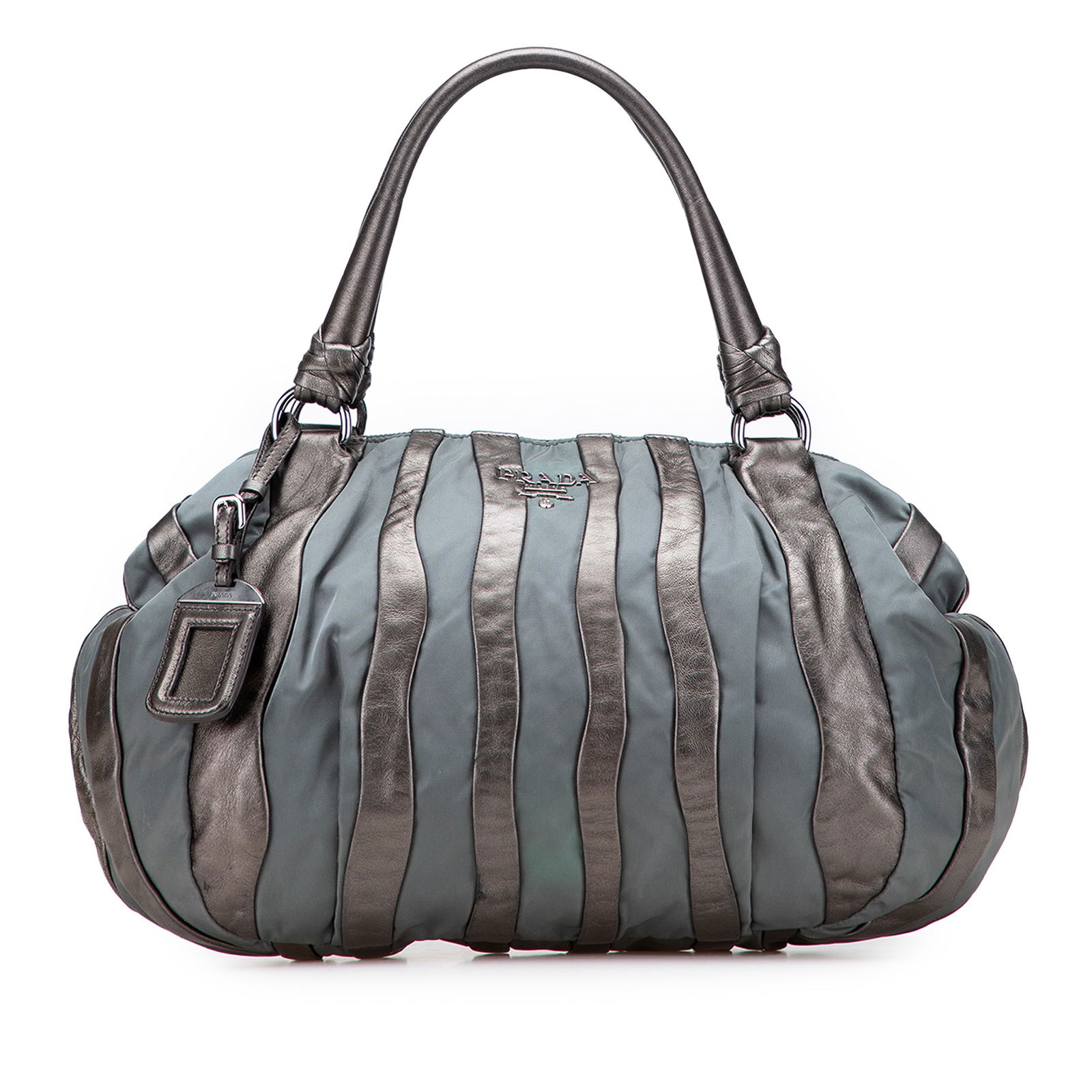 Prada Tessuto Nappa Waves Tote Gray Nylon Leather Bag: Prada Tessuto Nappa Waves Tote Gray Nylon Leather Bag Introducing the Prada Tessuto Nappa Waves Tote, a sophisticated accessory crafted from a blend of nylon and nappa leather. This stylish tote featu
