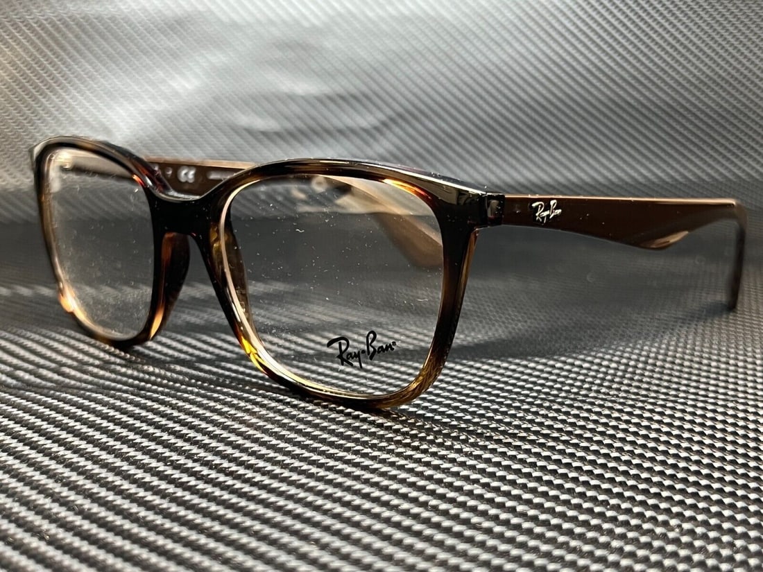 Ray-Ban RX7066 5577 Havana Square 52mm Unisex Eyeglasses with Case: Ray-Ban RX7066 5577 Havana Square 52mm Unisex Eyeglasses with Case Experience style and clarity with these Ray-Ban RX7066 5577 Havana Square Eyeglasses. Designed for unisex wear, these eyeglasses feat