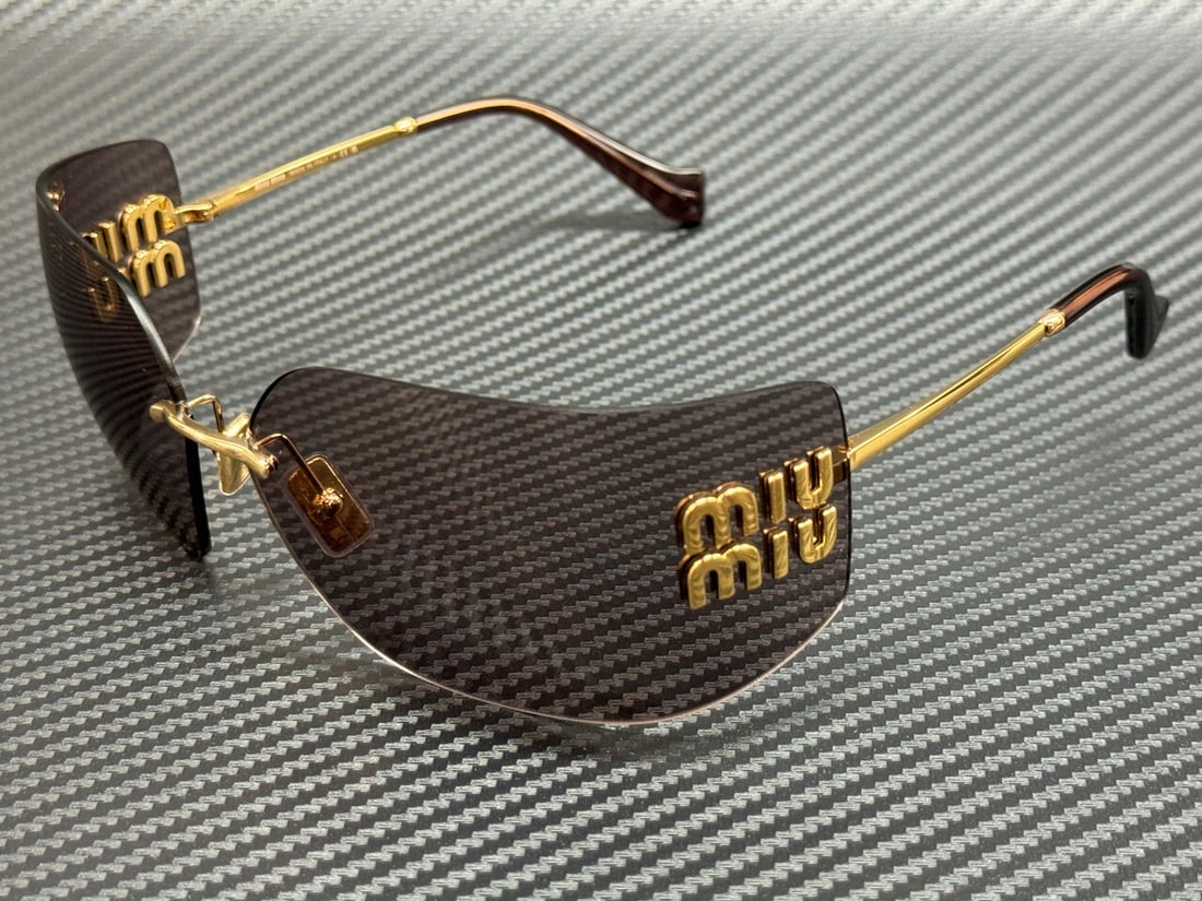 Miu Miu MU 54YS 5AK06I Gold Frame Purple Brown Sunglasses: Miu Miu MU 54YS 5AK06I Gold Frame Purple Brown Sunglasses Elevate your style with these stunning Miu Miu MU 54YS 5AK06I sunglasses. Featuring a luxurious gold frame complemented by striking purple bro