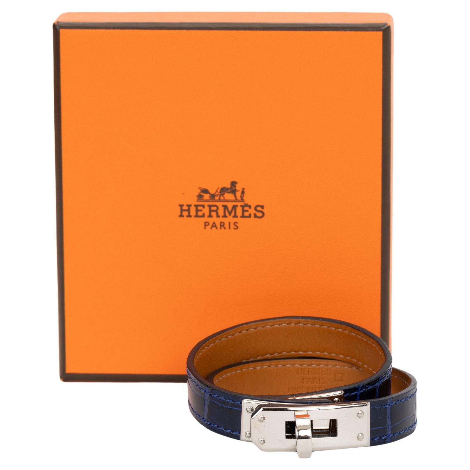 Hermes Kelly Double Tour Bracelet Blue Croc Leather Palladium Hardware: Hermes Kelly Double Tour Bracelet Blue Croc Leather Palladium Hardware The Hermes Kelly Double Tour Croc Bracelet is a stunning accessory crafted from luxurious blue crocodile leather and adorned with
