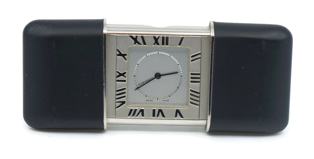 Tiffany & Co Vintage Desk Clock 33mm 100% Authentic: Tiffany & Co Vintage Desk Clock 33mm 100% Authentic This vintage desk clock from Tiffany & Co. is a stunning addition to any collection or home decor. Crafted with precision, it features a 33 mm case 