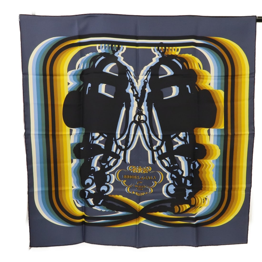 HERMES Silk Scarf Gray Yellow Black Blue Elegant Accessory: HERMES Silk Scarf Gray Yellow Black Blue Elegant Accessory This elegant HERMES scarf is crafted from luxurious silk, showcasing a sophisticated blend of gray, yellow, black, and blue colors. The scarf