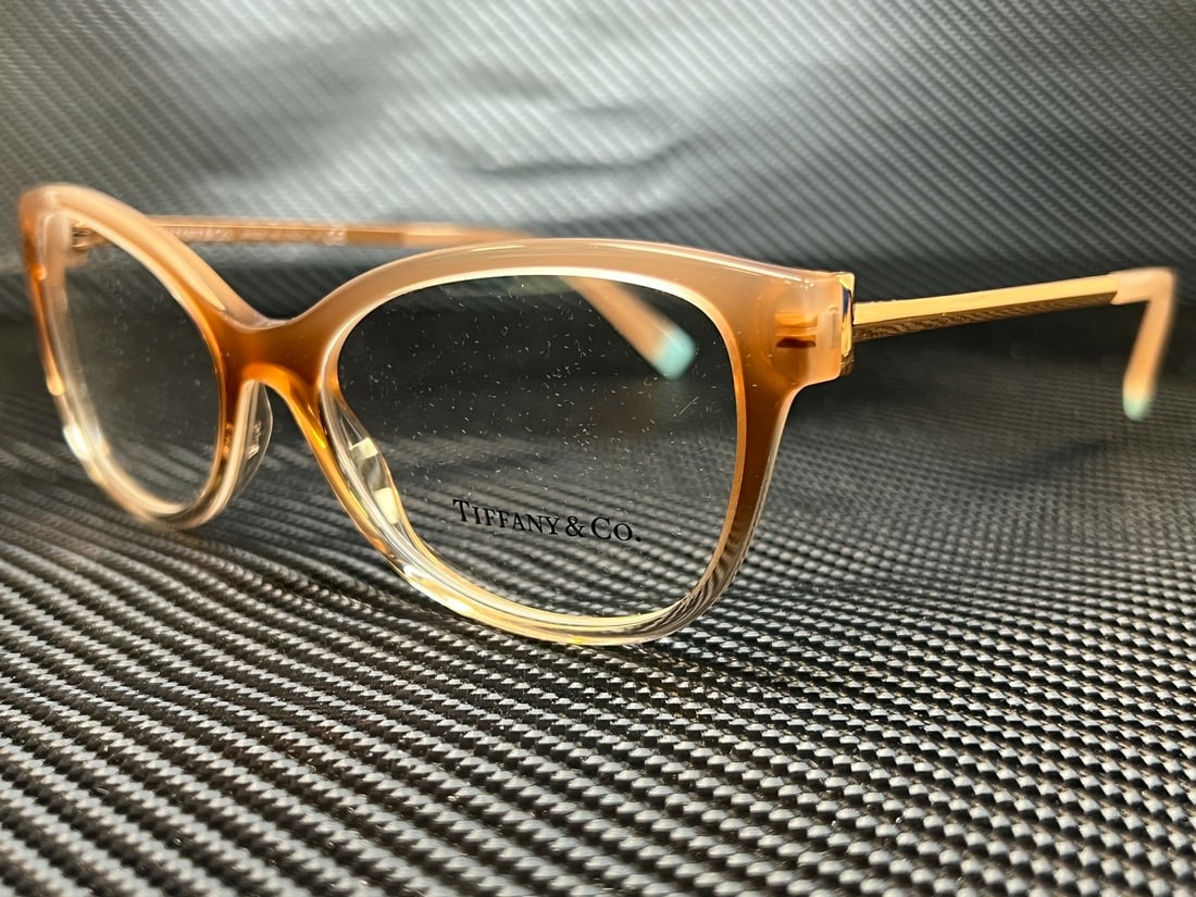 Tiffany TF2190 8299 Sand Gradient Women's Eyeglasses with Certificate of Authenticity: Tiffany TF2190 8299 Sand Gradient Women's Eyeglasses with Certificate of Authenticity Elevate your eyewear collection with these TIFFANY TF2190 8299 Sand Gradient Demo Lens Women's Eyeglasses. Featuri