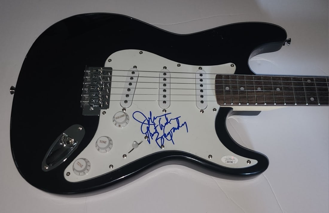 Berry Gordy Hand Signed Electric Guitar with JSA Authentication: Berry Gordy Hand Signed Electric Guitar with JSA Authentication This custom electric guitar features the authentic hand signature of Berry Gordy, renowned music producer and founder of Motown. The gui