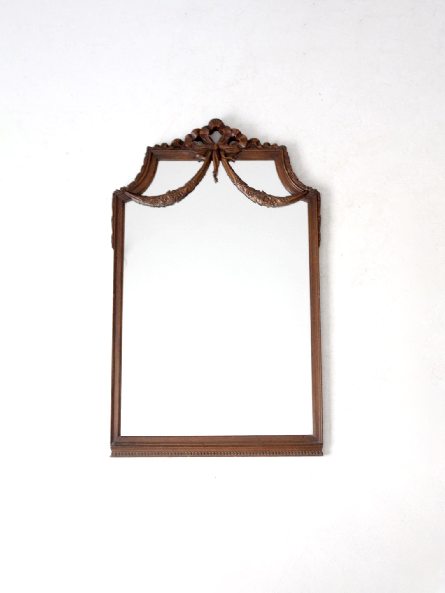Elegant Antique French Rococo Style Decorative Mirror 43.25 x 26.75: Elegant Antique French Rococo Style Decorative Mirror 43.25 x 26.75 This exquisite antique mirror showcases the intricate craftsmanship of early 20th-century French Decorative Art. The wooden frame is