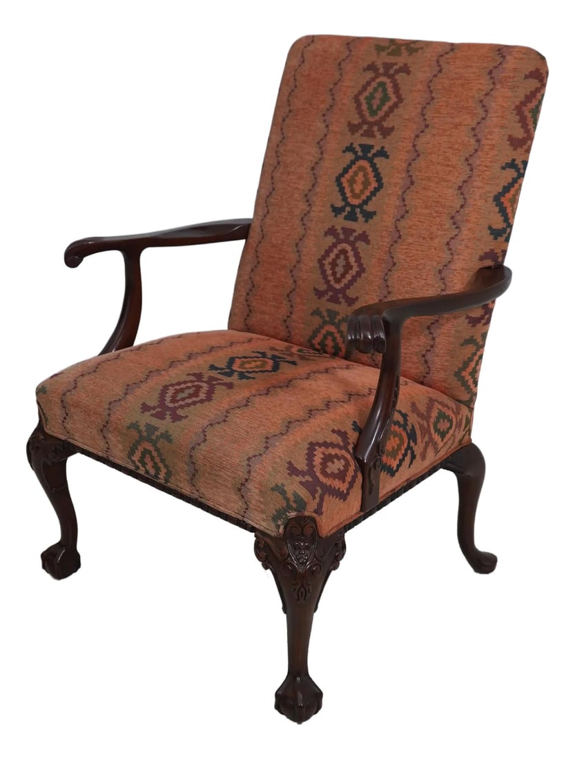 Southwood Chippendale Style Mahogany Library Chair with Queen Anne Legs: Southwood Chippendale Style Mahogany Library Chair with Queen Anne Legs This exquisite Southwood Carved Mahogany Chippendale Style Library Chair showcases fine craftsmanship with its detailed carvings