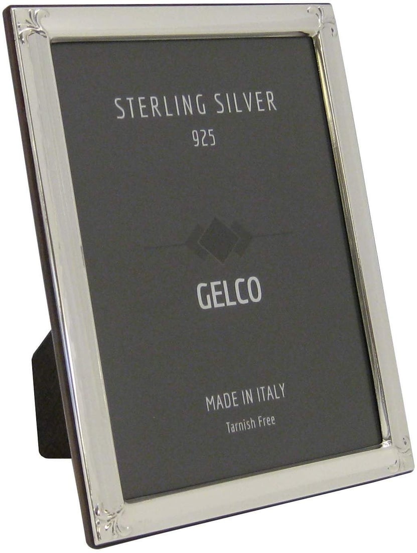 Gelco 925 Sterling Silver Floral Chased 5x7 Picture Frame: Gelco 925 Sterling Silver Floral Chased 5x7 Picture Frame Showcase your cherished memories in this exquisite Gelco Italian 925 Sterling Silver Picture Frame. Designed with floral chased corners, this
